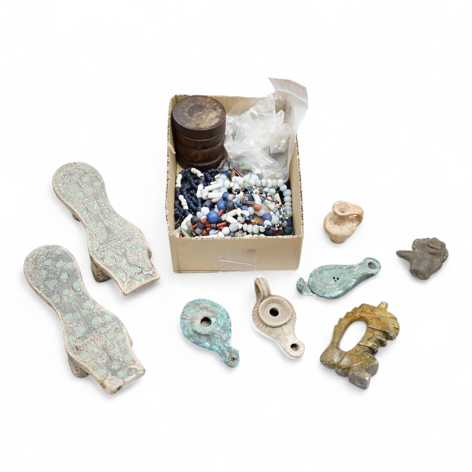 A pair of Turkish bath shoes, a collection of African beads and Middle Eastern vessels etc.
